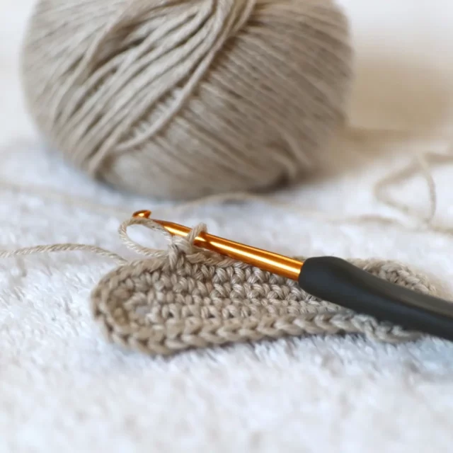 What is the difference between knitting and crocheting?